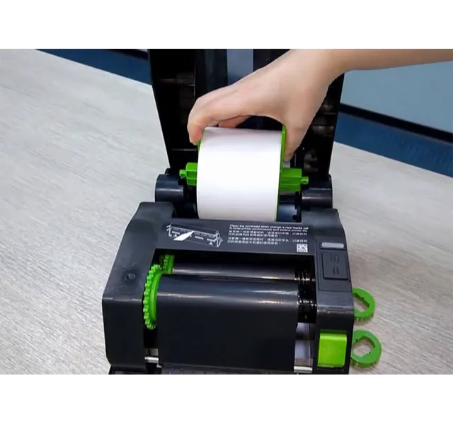 Hướng dẫn lắp giấy cho máy in mã vạch